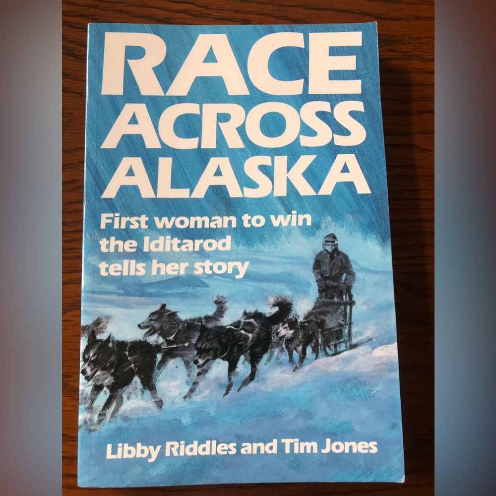 NEW RACE ACROSS ALASKA BY LIBBY  RIDDLES AND TIM JONES SOFTCOVER